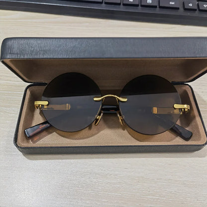 "Cristallo Puro" – Rimless Round Sunglasses By Enzo Bellari®