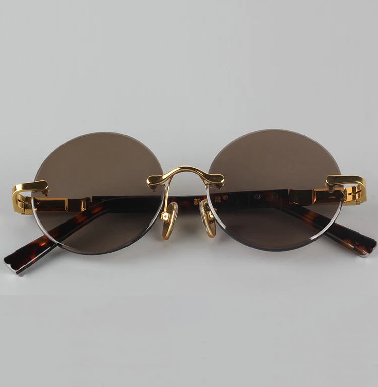 "Cristallo Puro" – Rimless Round Sunglasses By Enzo Bellari®