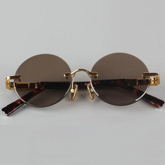 "Cristallo Puro" – Rimless Round Sunglasses By Enzo Bellari®